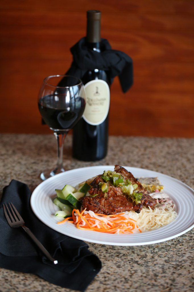 The fragrant rice plate combo at Co’m comes with a little bit of everything: a fried egg, bits of shredded pork, shrimp cake, veggies and protein of choice. (We like the pork-chop version, shown here.)
