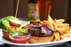 Buckhead Diner’s Brisket and short-rib meat transform burgers into juicy, multi napkin affairs. Why not add bacon?