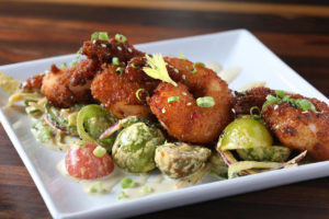 Secreto's 'bang-bang' shrimp: Not exactly Southern, but a mouthwatering accompaniment for signature cocktails.