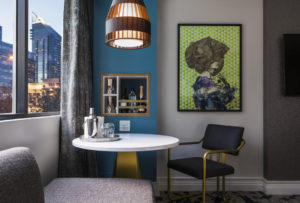 Rooms feature vibrant hues and feminine art, setting the stage for a fun-filled stay.