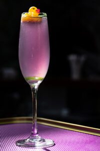 The Not So French 76 from The Garden Room is a violet-hued dream.