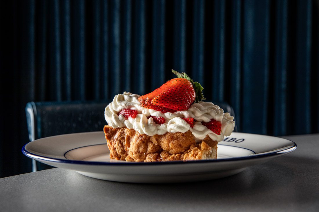 Roshambo's decadent butter cake, topped with sky-high whipped cream, is a sweet end to any meal.