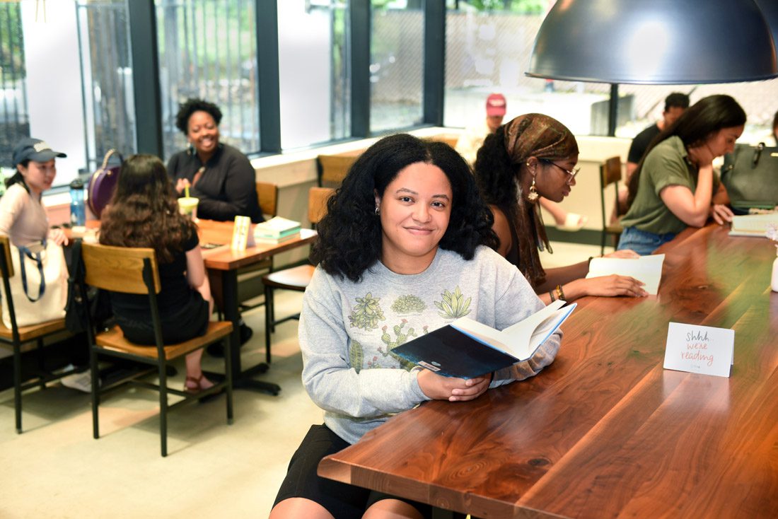 Kayla Nelson, co-founder of the Buckhead Silent Reading Book Club, joins likeminded enthusiasts in quiet reading.