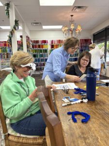 Teacher Marci Slotin offers one-on-one instruction during class.