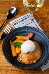 Don’t skip desserts like peach hand pie with vanilla ice cream.