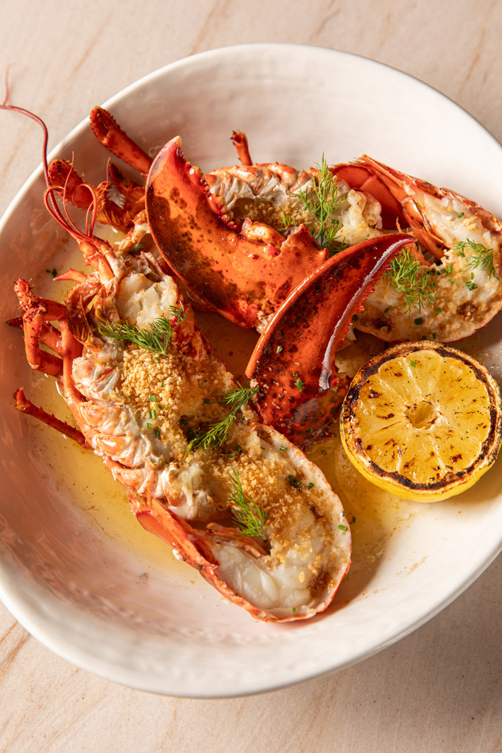 You can’t go wrong with a whole lobster, grilled to perfection and topped with crunchy brioche crumbs.