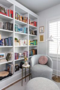 Custom shelving accomodates the homeowner's book collection in the study.