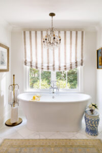 The deep freestanding bathtub is the star of the show in the primary bathroom.
