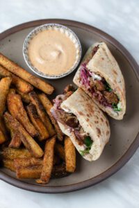 Choose a side of crisp fries or a green salad with any lunch sandwich plate.