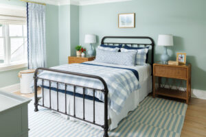 Sessions chose to play with pattern upon pattern in Abram's son's room. Gingham, stripes and dots add mature personality that can grow with him.
