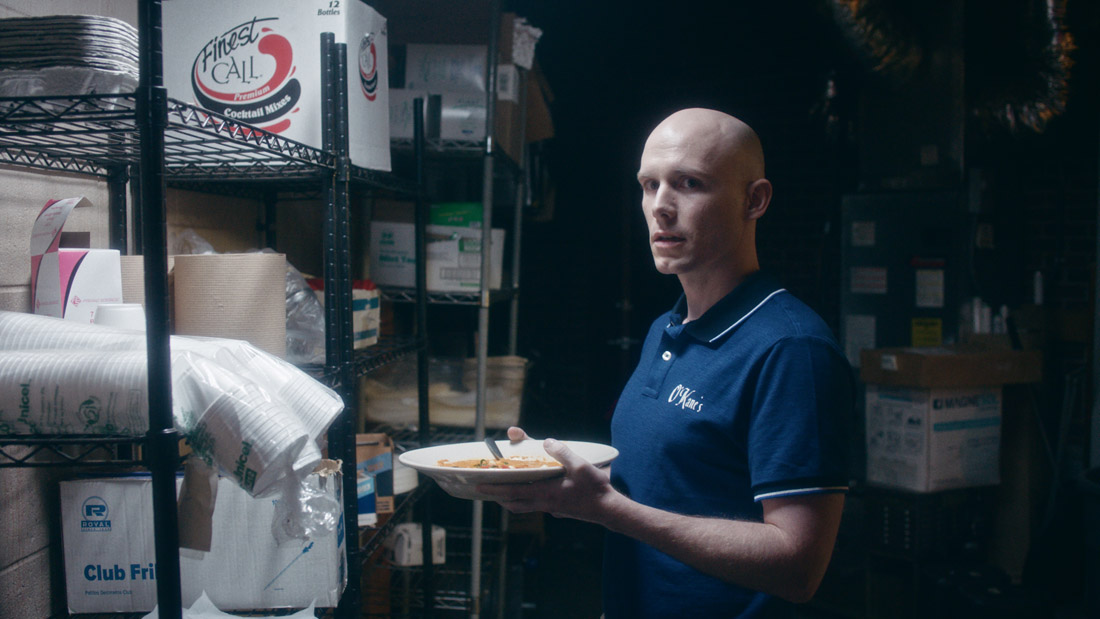 Aaron Goldenberg says that as a restaurant worker, he's nothing like his We're So Dead character.