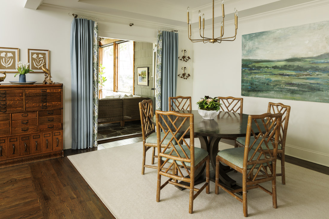 The painting in the dining room by Tyler Colgan through Atlanta Artist Collective reminds Janie Beck of her favorite vista in Sewanee, Tennessee where she went to college.