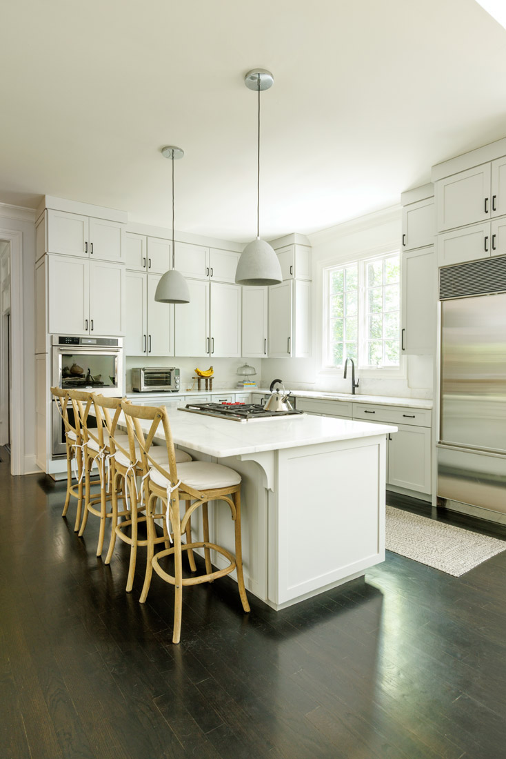The kitchen's simplicity is purposeful; the Millers don't often cook, so it's streamlined and tidy.
