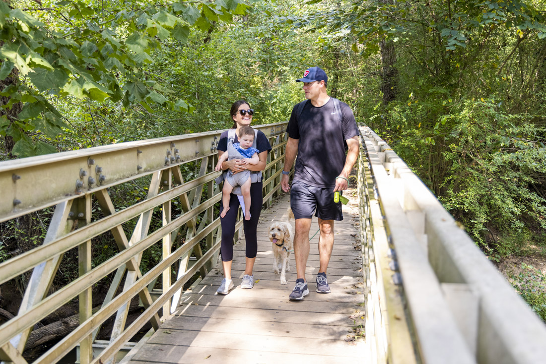 A family and their dog enjoy a walk on East Palisades Trail. photo: Explore Georgia