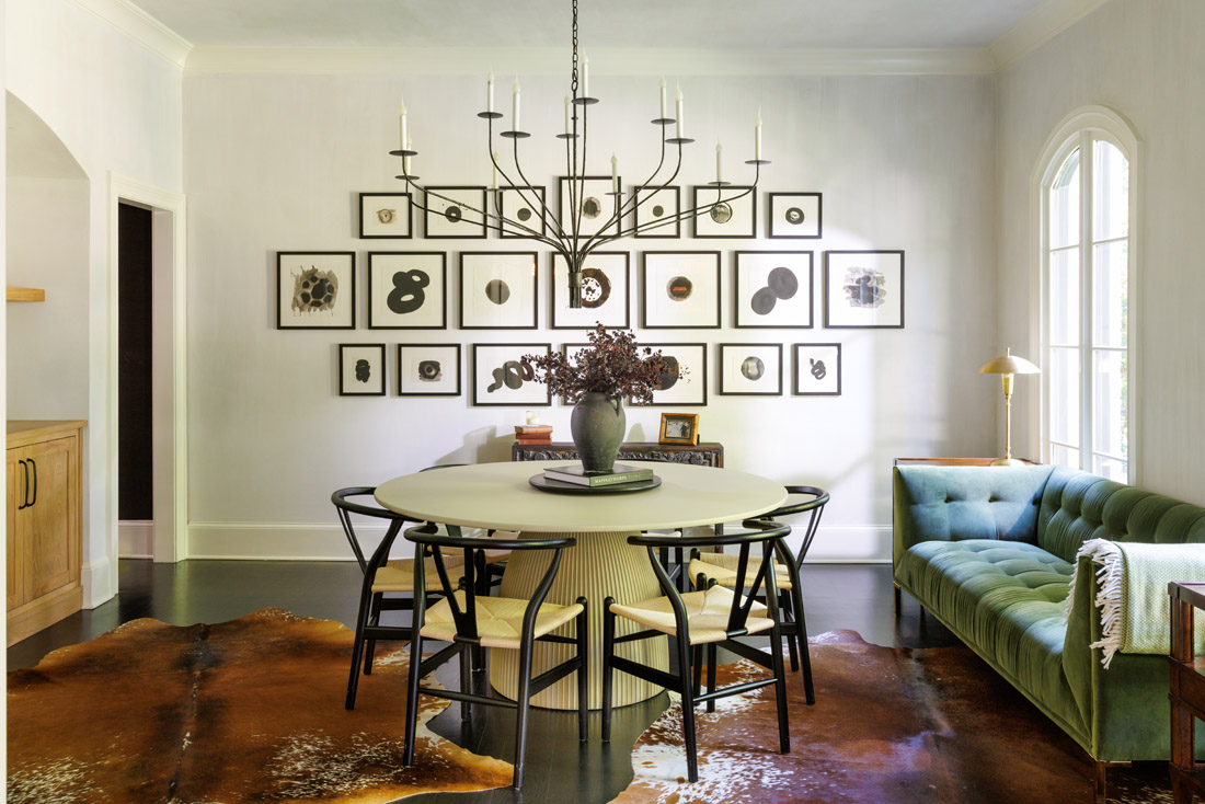 Artwork from Bella Cucina in Buckhead is creatively hung in the dining room.